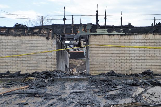 A two-alarm fire completely destroyed a six-unit apartment complex at 405 Sunset Ln. on Sunday morning. The building has been vacant for a number of years.