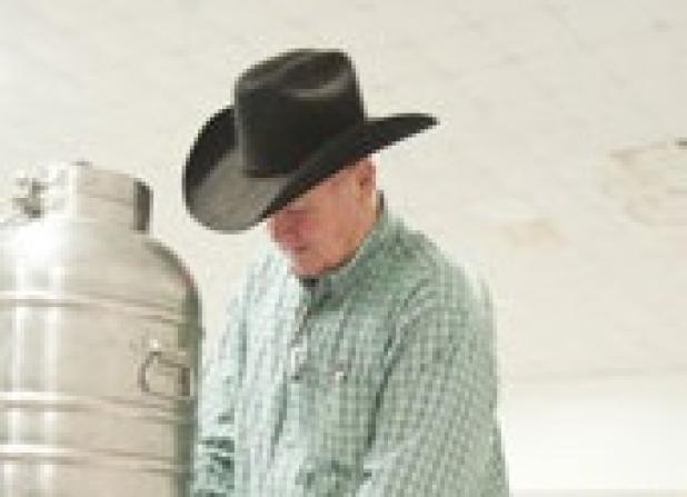 County Commissioner, Don Jones serves drinks at the county employee luncheon Thursday.