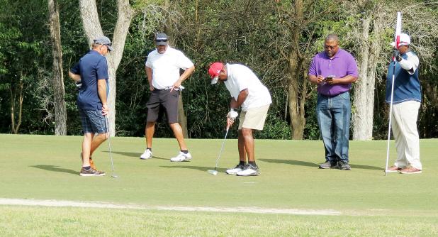 CCLP/DAVID J. HARDIN - A golfer takes aim at the hole during the inaugural Chief Molnes Scholarship Golf Tournament held at the Hills of Cove Golf Course on Saturday. The event was created to honor Copperas Cove’s late chief of police and to raise money for scholarships for Law Enforcement Explorer students as well as graduating seniors from Copperas Cove High School.
