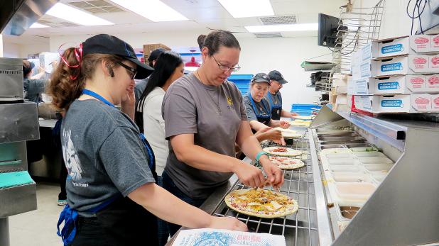 CCLP/DAVID J. HARDIN Domino’s Pizza opened their kitchen to familes and soldiers of Fort Hood during the 12th annual Soldier Appreciation Day on Sunday.  Domino’s Pizza employees from across the state  checked into the Copperas Cove location to assist in the annual program that includes music and games for the whole family.