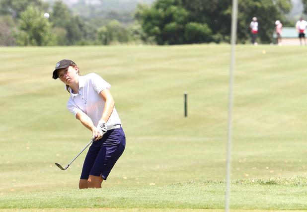CCLP/TJ MAXWELL - Cove’s Elle Fox chips on to the green during the final day of the Starburst Junior Golf Classic at the Stonetree Golf Course in Killeen. Fox shot a three-day total of 236 (77, 83, 76) to win the girls’ 13 year-old division.