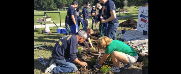 CCLP/FILE PHOTO - JROTC and KCCB members complete a beautification project at the entrance to the Hills of Cove Golf Course on May 7. KCCB has finished the Great American Cleanup for 2016. Its next community event is October’s EcoHarvest.