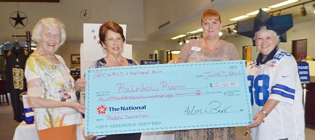 CCLP/LYNETTE SOWELL - Janie French and Rita Burgess with the Coryell County Rainbow Room receive a check for $2,160 from Nicole Vess and Shelby Kelly with Operation-CURLS.