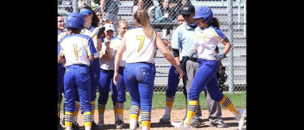 CCLP/TJ MAXWELL - Copperas Cove sophomore Jayda Carter is welcomed home by teammates after connecting on a game-tying solo home run in the first inning of the Lady Dawgs’ 10-3 win over the Lady Wolves Wednesday at Copperas Cove High School. The Lady Dawgs (12-6-1, 4-1 in District 8-6A) return to action with a road game against Killeen tonight.