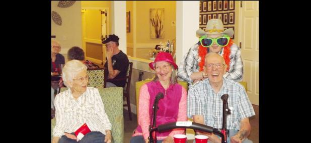 CCLP/PAMELA GRANT - Jimmy Hensley poses in his country themed outfit with country singers Frank Arellano and Tom Howard with Frankly Country.