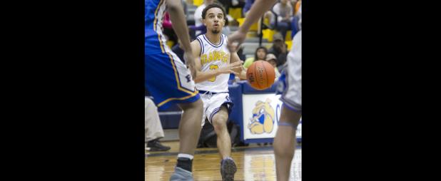 CCLP/TJ MAXWELL - Cove senior Jordan Govan looks for a shot in the second half of the Dawgs’ 61-45 loss to Pflugerville on Tuesday.