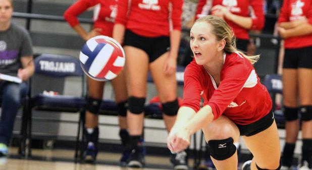 Cove’s Katy Ranes gets one of her 14 digs during the third annual Fellowship of Christian Athletes Victory Bowl volleyball game on Saturday. Ranes had 22 assists and 14 digs in the contest. 