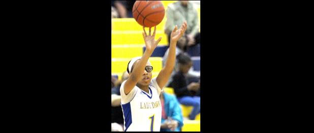 CCLP/TJ MAXWELL - Cove senior Kaycie Gatewood fires from three-point range during the Lady Dawgs 59-47 win over Heights.