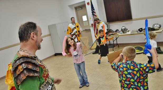 CCLP/FILE - Kids try out their shields during the 2015 Summer Reading program kickoff celebration.