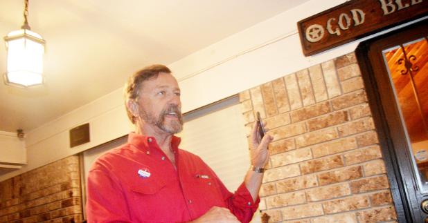 CCLP/LYNETTE SOWELL - Copperas Cove City Council Place 5 incumbent Kirby Lack holds up his phone as he waits for the results to come in Tuesday evening at his home in Copperas Cove. Lack pulled in 58.63 percent of the vote to Marc Payne’s 41.37 percent.