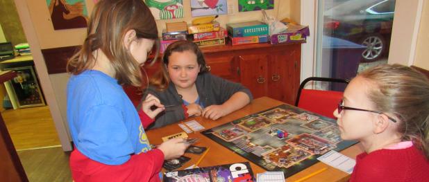 CCLP/BRITTANY FHOLER - Lilyann Rylant, Abigail Richmond and Morgan Galibeau played a game of Clue at the Art Lab’s last Tween Club meeting of 2016 on Friday.