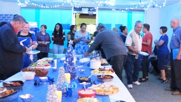CCLP/DAVID J. HARDIN - Local residents and volunteers of the Blue Santa of Copperas Cove enjoy food, friendship, and giving, as Blue Santa held its annual open house to kickoff the season of collecting toys and donations, for kids who are in need this holiday season.