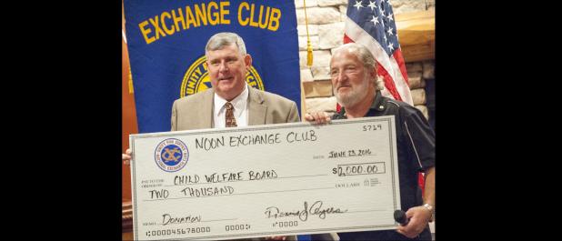CCLP/DAVID MORRIS - Noon Exchange Club President Dennis Ayres, right, presents Judge John Firth a check for the Coryell County Child Welfare Board.