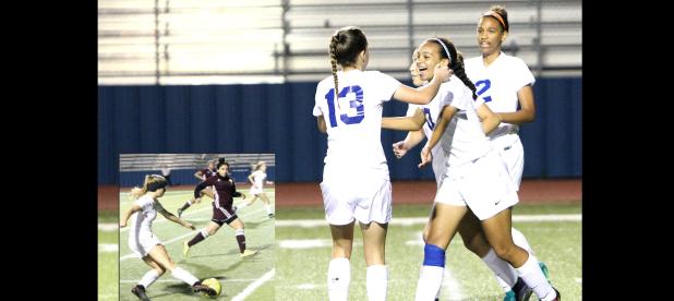 CCLP/TJ MAXWELL - INSET: Copperas Cove junior Nicole Evans makes a cross to sophomore Mariah Ruiz during the first half of the Lady Dawgs’ playoff-clinching 1-0 win over Killeen Friday night at Bulldawg Stadium. ABOVE: Freshman Haven Stevenson celebrates with teammates Kailey Walker (13) and senior Jordan Campbell after she scored with a header on a cross from Evans in the 37th minute.