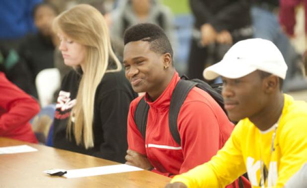Phillip Baptiste smiles as his accolades are announced during the National Signing Day festivities.