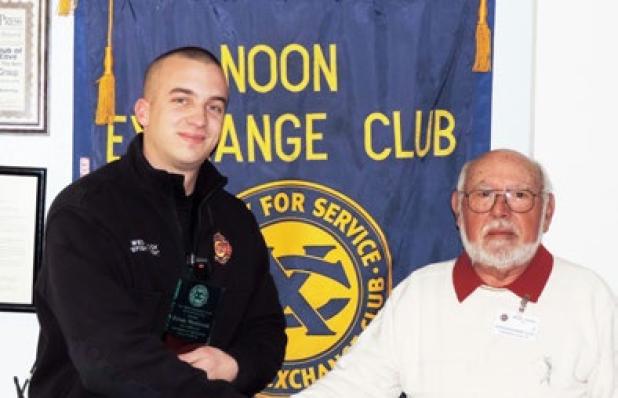 President Elect of the Noon Exchange Club of Copperas Cove Sandhor Vegh presents Firefighter Ethan Westbrook the Firefighter of the Quarter Award during the Jan. 24 meeting.