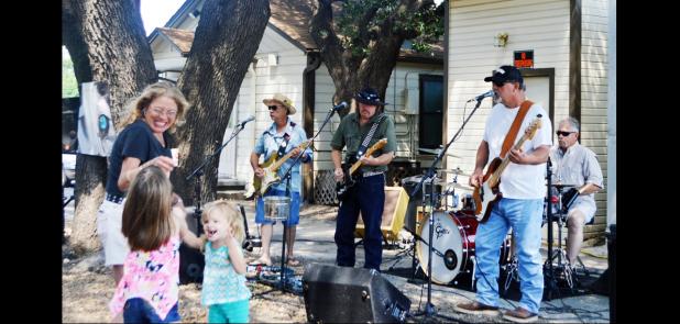 FILE PHOTO - Rare Dog performs under the live oak trees behind Grill Daddy’s on Avenue D. The band will be there on Saturday for the restaurant’s 2nd annual backyard bash, featuring specials and door prizes.
