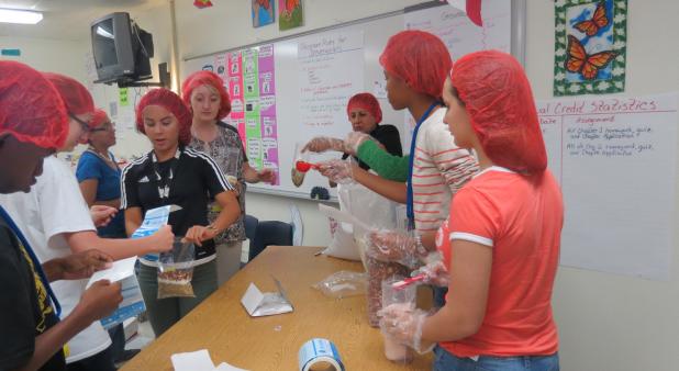 CCLP/BRITTANY FHOLER - Students assembled 75 bags of lentil soup to be donated to a local food bank at the first meeting for the Chick-fil-A Leader Academy held Monday evening at the Copperas Cove High School.
