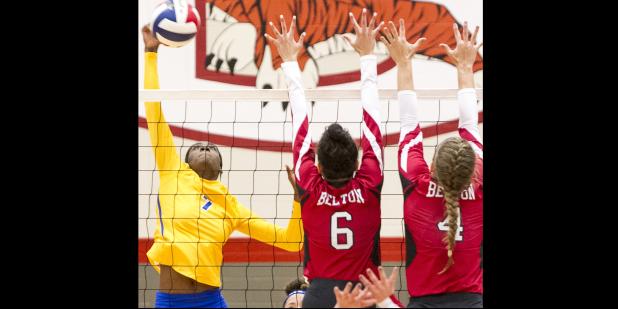 CCLP/TJ MAXWELL - Copperas Cove junior Talia Kinslow (7) hits for one of her game-high 21 kills in the Lady Dawgs’ 3-2 win over the Belton Lady Tigers on Tuesday in Belton.