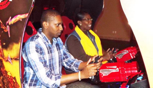 CCLP/PAMELA GRANT - Texas Virtual Academy student, Alex McVade, and his mother, Thelma McVade enjoy the arcade games at MAKS Fun Center. The two were there as part of the school’s celebration of National School Choice Week.