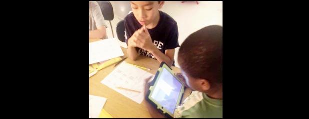 COURTESY PHOTO - Clements/Parsons Elementary third graders Tristan Chandler and Haun Tran collaborate on an assignment in class using Schoology, CCISD’s new learning management system that allows parents to get more involved in a student’s daily lessons in the classroom.
