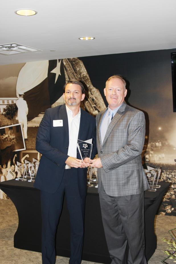 Copperas Cove High School senior counselor John Avritt receives the Very Important Counselor Award from TAMU Vice President of Academic Affairs, Scott McDonald. Avritt was one of a select few recognized statewide for his efforts to set students on the path to college.  – COURTESY PHOTO