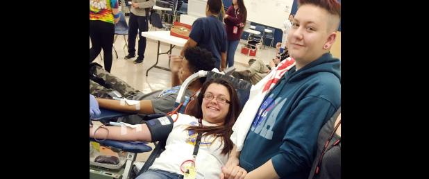 CCISD/Courtesy Photo - CCHS student Vivian Cohn clutches the hand of fellow student Victoria Zabatta while giving blood during the school’s bi-annual blood drive hosted by HOSA. The school collected 172 units of blood and has collected the most units of all of the Central Texas schools for the last four years consecutively.