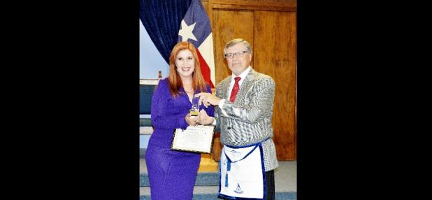 CCLP/LYNETTE SOWELL - Wendy Sledd received the Commnity Builder Award from Mt. Hiram Lodge No. 595 on Tuesday.