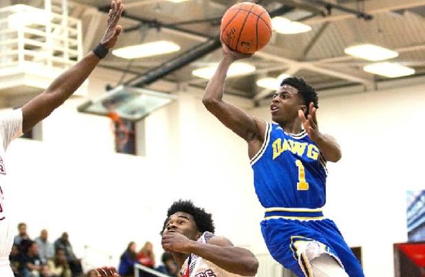 Copperas Cove senior Jordan Woodberry shoot over a pair of Harker Heights defenders during their 78-62 upset of the No. 7 Knights Friday in Harker Heights. Cove returns to action tonight with a home contest against the Shoemaker Grey Wolves.