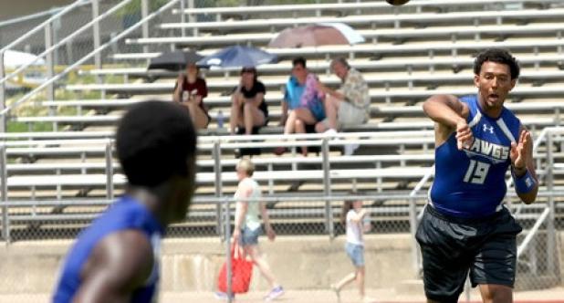 Copperas Cove quarterback Manny Harris makes a throw to wide out Derris Prater during pool play of the Lake Travis state qualifying tournament on May 31 at Cavalier Field. Copperas Cove finished second to advance to the 2014 State 7-on-7 Tournament on July 11-12 in College Station.