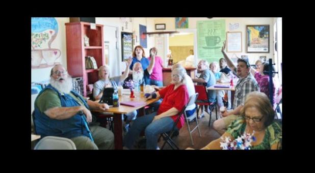Patrons enjoy the music and coffee at John’s Java House on Saturday
night.