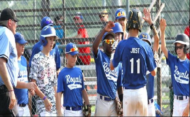 12U Cove Royals Colby Jost is wlecomed home after connecting on his fourth home run in two days during their 7-5 win over the Hillsboro Bobcats during the 2014 Texas Teenage 12U Open Base State Tournament in Beltonon Wednesday. Jost had two home runs on Tuesday against the Belton Angels and followed it up with two more on Wednesday against the Bobcats.