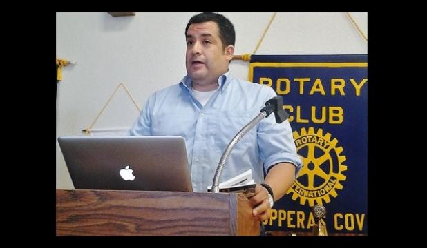 Orlando Castillo speaks to the Rotary Club about Go MAD ministries on Thursday.