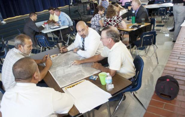Administrators from Copperas Cove Independent School District work through a tabletop exercise with emergency responders during an active shooter scenario.