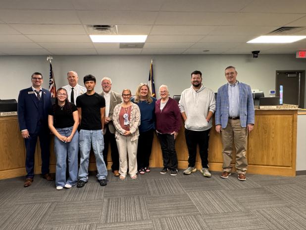 Students, Copperas Cove ISD representatives, along with City Manager Ryan Haverlah, Fire Chief Doug Matthijetz, and Mayor Dan D. Yancey gather for a photo after the Copperas Cove city council approved the donation of two out of commission ambulances to the Copperas Cove and Lampasas Independent School Districts. 