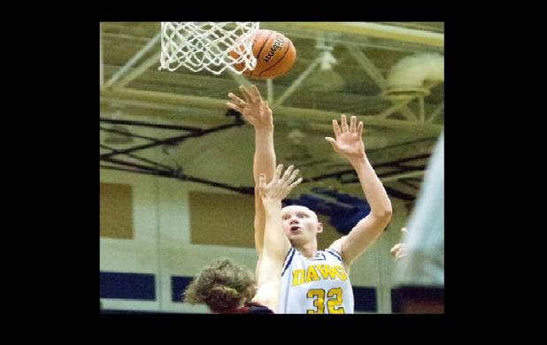 Copperas Cove junior Wyatt Behara shoots over Australia’s Jesse O’Dwyer during their 85-24 win over the Horizon Crocs from the Sydney, Australia area on Monday. Behara had a game-high 16 points, along with eight rebounds and six blocks for the Dawgs. Cove improved to 10-5 with the win. They are playing in the Round Rock Tournament this weeknd before returning home to host Waco LaVega on Tuesday.