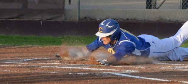 Kyle Winstead makes the slide into home plate adding a run early in the game against the Killeen Roos