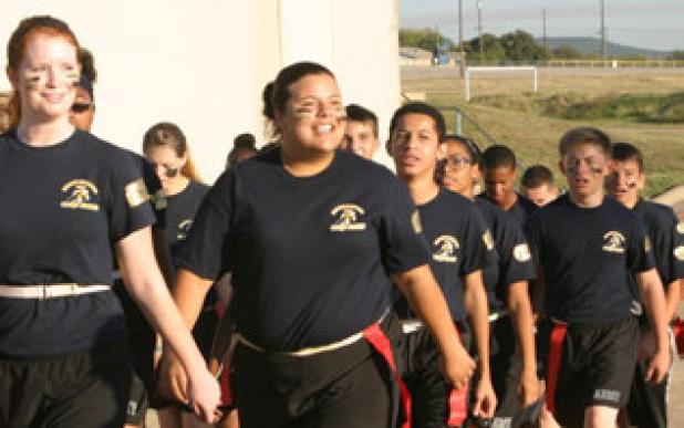 Cadets march around the high school campus during their organizational day.