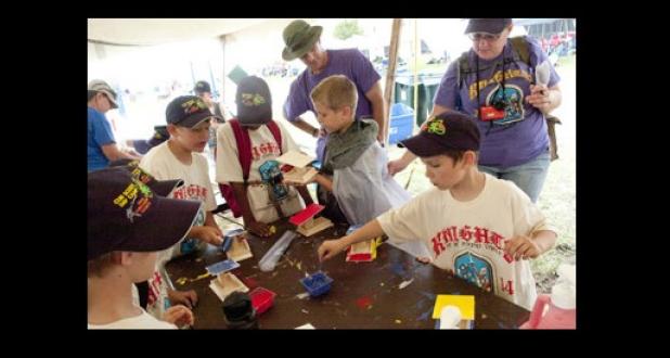 Cub scouts from Pack 252 in Copperas Cove work on building bird houses during arts and crafts Monday during the week long Cub Scout Day Camp on the campus of Central Texas College.