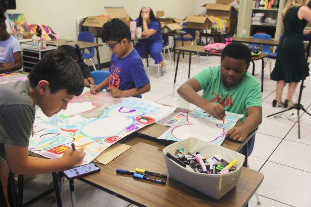 Students focus intently as they bring their creativity to life during the Art Expressions class at Central Texas College’s College for Kids program, where young artists explore emotions and self-expression through drawing, painting, and other hands-on techniques.