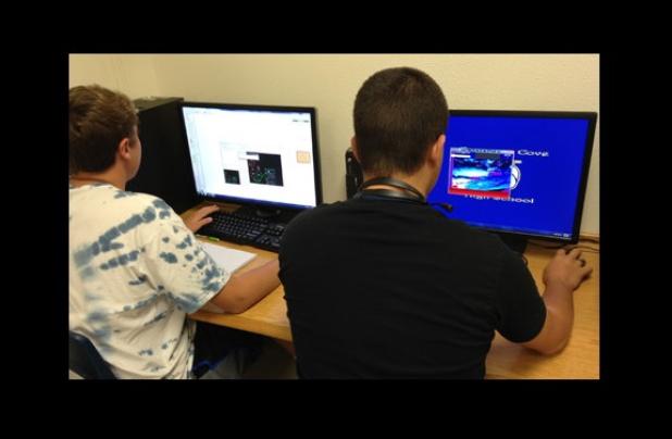 Joshua Bishop and Francisco Quinones work on games they are creating as students in Copperas Cove High School’s Advanced Video Game Design III class.