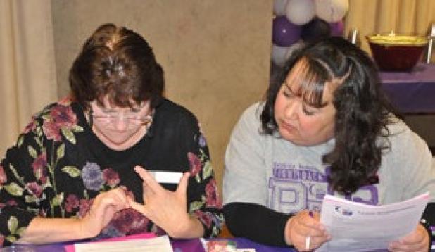 Cancer survivor, Lindy Sudduth and Co-Chair Rose Fleming participate in Thursdays Relay for Life Bingo.