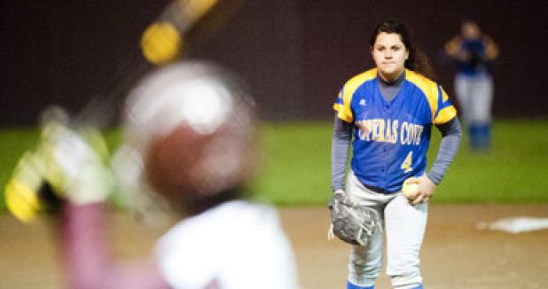 Junior Carlee Duran stares in for a sign as she prepares to pitch in the first inning of play Tuesday. Duran struck out six in five innings of work.