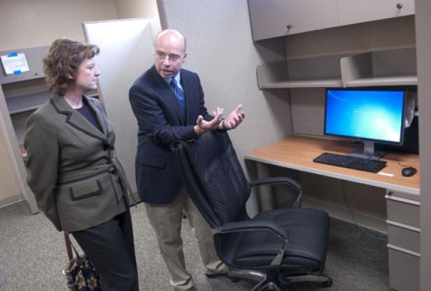 Dr. Ray Harrison and his wife Dr. Karen Harrison discuss the cubical offices that eight doctors will share in the newly constructed Scott & White clinic built in Copperas Cove. The husband and wife pair expect the clinic to open in June and look to fill their staff with residents from Copperas Cove.