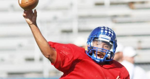 Copperas Cove junior quarterback Manny Harris makes a throw during 7-on-7 drills as part of practice on Wednesday at Bulldawg Stadium.