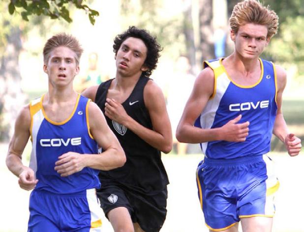 Copperas Cove sophomore runners Christian Schaffer, left, and Mike Akers pushed each other through the three-mile course at Long Branch Park in Killeen on their way to top 10 finishes in the District 12-6A Cross Country Meet on Wednesday. Both the boys’ and girls’ teams qualified for the Region II meet on Nov. 1