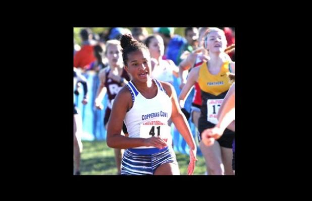 Copperas Cove sophomore Amber Boyd closes in on the finish line of the UIL Region II Cross Country Championships. Boyd finished 62nd to lead the Lady Dawgs.