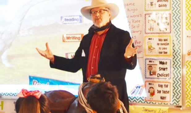Local history buff, James Powell, shares highlights of Texas and local history with Clements-Parsons second graders on Thursday morning.