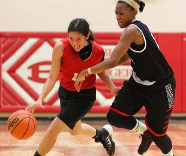 Copperas Cove’s Katurah Taylor guards Belton’s Aubrianna Garcia during their game in the Belton Fall League on Thursday at Belton High School. The Cove Crusaders went undefeated in the league with a 10-0 record.