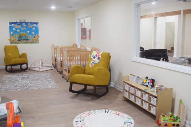 The infant room at World of Wonder Academy offer a quiet atmosphere for babies to grow and play.